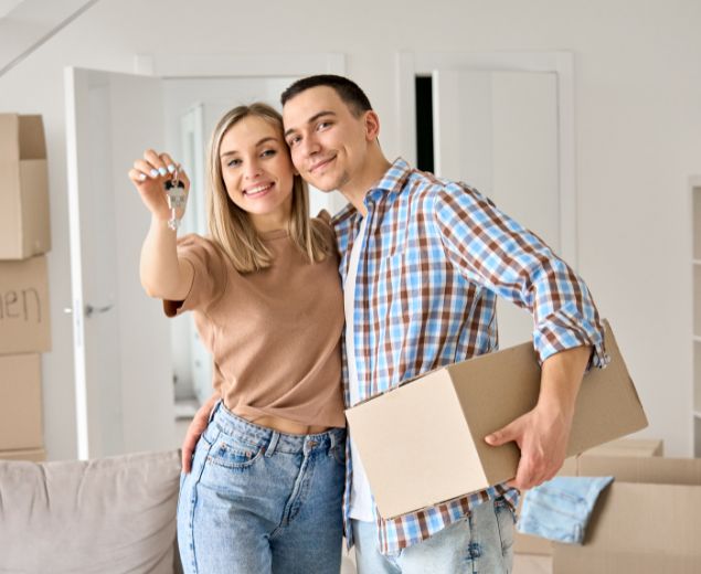 image of couple with new home image of couple with new home