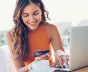photo of woman using credit card photo of woman using credit card