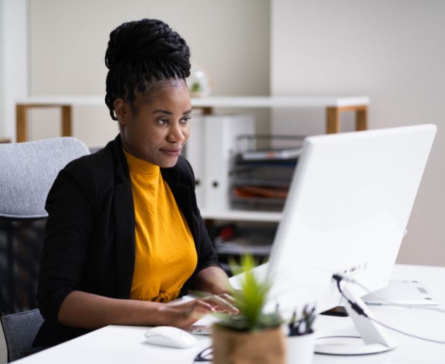 woman applying for loan on computer image