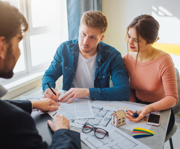 3 A couple signing paperwork