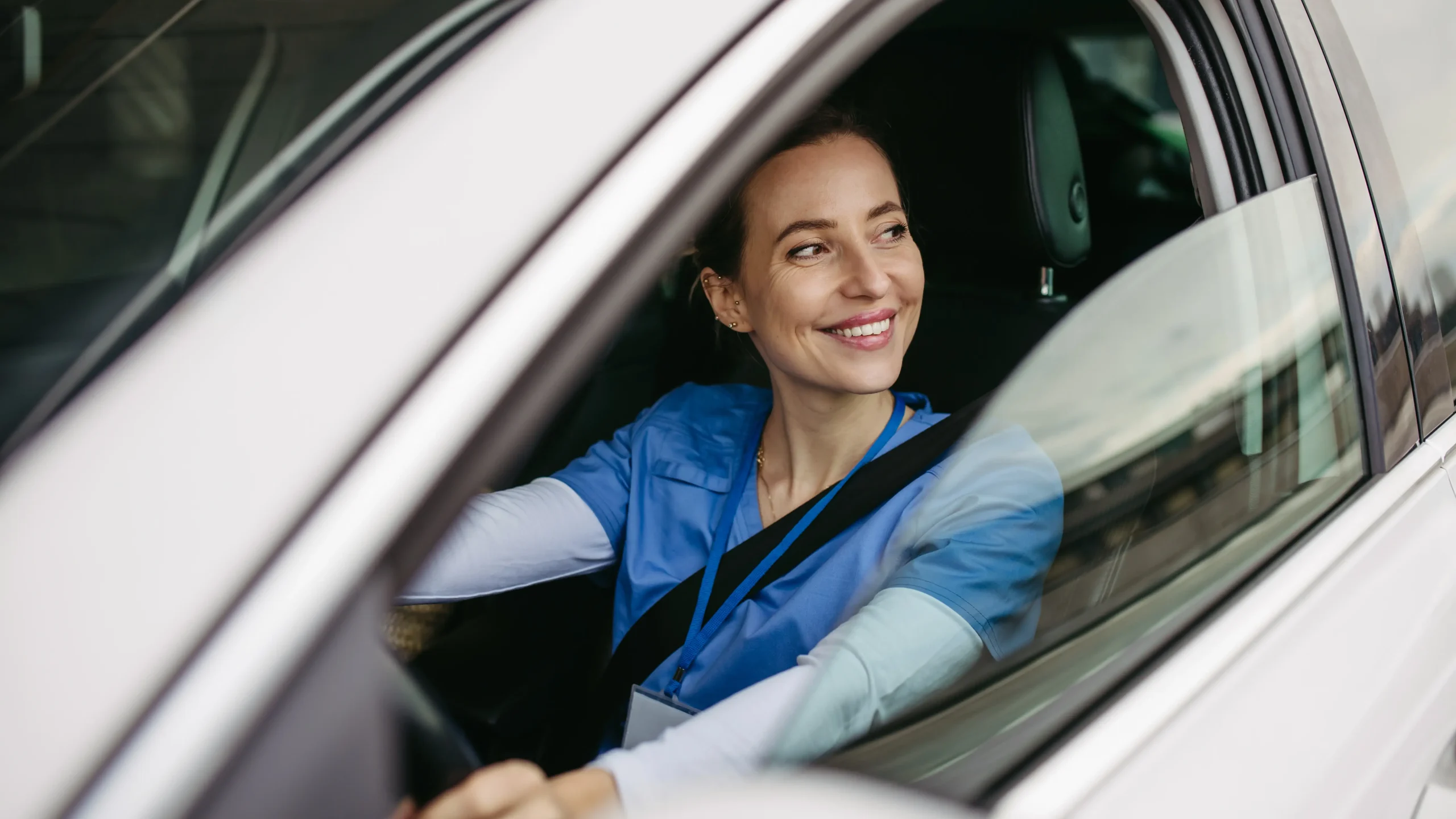 AdobeStock 728314375 medical worker driving car